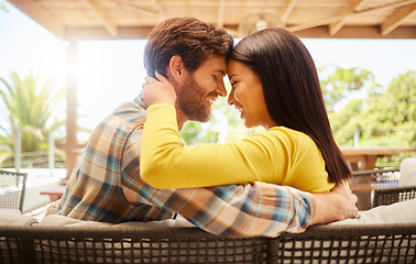 Image showing Happy, smile and love couple relax in home backyard patio in sun together outdoor. Young people, partner date and content man and woman in safe, intimate and care relationship with hug and happiness