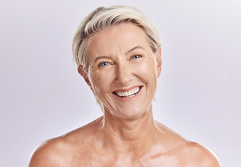 Image showing Beauty and skincare of a senior woman with smooth skin and healthy teeth against a pink background. Portrait of a happy mature, elderly or old female smiling due to cosmetic wellness