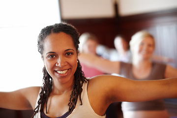 Image showing Woman in yoga fitness studio, exercise pilates in training class and wellness motivation. Black lady happy workout, muscle floor stretching in group gym class and coach practice self care together