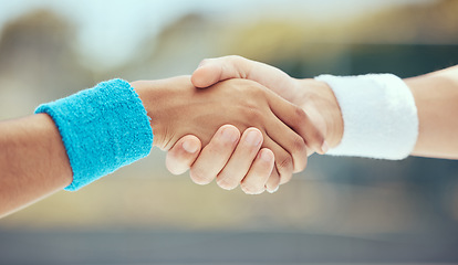 Image showing Handshake, teamwork and sport with the hands of sports people in collaboration outside after a game or match. Sportsmanship, fitness and exercise with friends playing or competing outdoors in the day