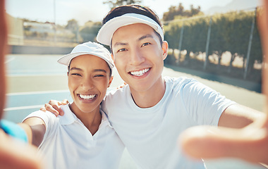 Image showing Selfie, tennis and court sports with people taking happy, smile and fun photograph for social media. Portrait of asian man, coach and winner woman after success training, workout and fitness exercise