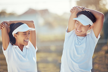 Image showing Tennis players stretching arms for a warm up exercise for the joints or muscles for outdoor sport game. Fit, active and happy man and woman athletes preparing for training or practice for a match.