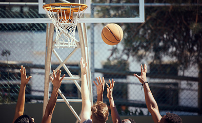 Image showing Basketball, sports and fitness with friends on a court for sport, health and exercise outside during summer. Training, workout and recreation with a team of players playing a game or match outdoors