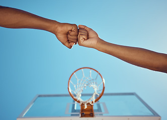 Image showing Hands of basketball friends or team fist bump at game training and practice match at basketball court. Competitive athlete people in unity, solidarity and union play together sports hobby for fitness