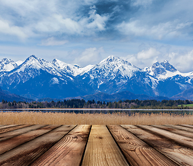 Image showing Wooden planks floor with Bavarian Alps landscape