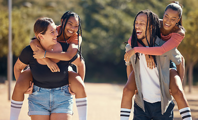 Image showing Friends, running and happy park group doing a piggy back race in nature. Diversity of laughing friendship of women and a man from Jamaica having a fun comic time and experience in the sun in summer