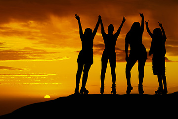 Image showing Roller skating friends silhouette on hill with sunset sky horizon. Young, fitness or carefree people or gen z shadow at night with orange and yellow background sky for wellness, youth and adventure
