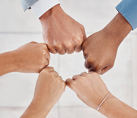 Image showing Hands of business people in circle for support in meeting, trust in team success and community in collaboration in working office. Business people, employees and workers in agreement with fist bump