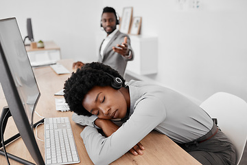 Image showing Tired call center worker sleeping at desk, burnout from working at telemarketing company and stress from consulting with people online on computer. Customer service employee with sleep problem