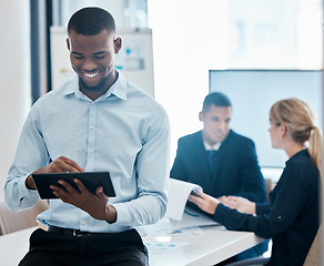 Image showing Business man, tablet and marketing research for crm while in team meeting with a smile for good feedback. Diversity, corporate and professional group of people doing planning and working in a office