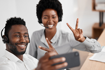 Image showing Selfie, peace and friends in a call center with a consultant and colleague in customer support, telemarketing and sales. Contact us, crm and consulting with people taking a photograph in an office