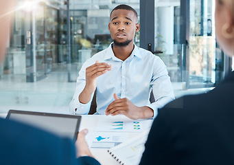 Image showing Black man, interview and office presentation to business team on analysis, data and research. African man in corporate discussion explaining company strategy and analytics for innovation and goals