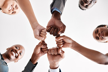 Image showing Diversity, hand, or fist group of business people trust, unite and support at work. Below view of happy corporate professional team hands touching showing success and collaboration in startup office