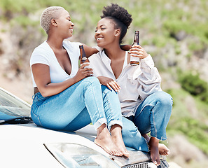 Image showing Car, beer and lesbian couple on a road trip love relaxing in nature together in summer drinking alcohol outdoors. Drunk, smile and happy African LGBT girls or women in fun relationship or friendship