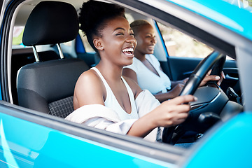Image showing Woman driving, friends and roadtrip for a fun and happy drive while enjoying their vacation, trip and journey together. Black women laughing and talking while sitting in car for an adventure or lift