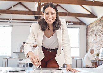 Image showing Architecture, young woman and designer planning, drawing and drafting blueprint, construction project and property building in startup agency. Portrait of engineer, creative and industrial floor plan