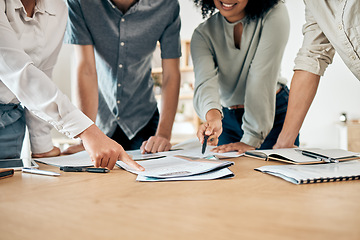 Image showing Business people planning strategy in meeting, discussion about marketing documents and reading advertising report for startup company. Team collaboration for creative idea on paper in work office