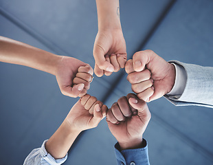 Image showing Team success and motivation fist bump of business people with teamwork, work support hand sign. Office group hands together in a circle to show job community, goal collaboration and career target