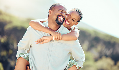 Image showing Happy, couple and black woman getting a piggy back ride from African husband on a countryside summer vacation. Smile, relax and travel outdoors on a romantic, love and peaceful nature holiday park