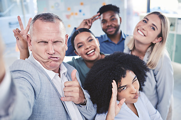 Image showing Creative, fun and business team taking a selfie together while in a corporate office. Happy employee friends taking a silly, funny and comic work picture in the company conference room.