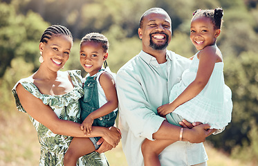 Image showing Happy black family, parents and kids in park, garden or backyard to relax, bond and enjoy sunny day together. Portrait of happy mother, smile father and young african children with love, care and joy