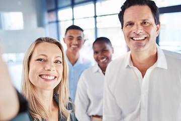 Image showing Partnership, diversity and a business team take a selfie in office after startup launch. Teamwork, confidence and support, happy to be working together. Proud corporate men and woman smile for photo