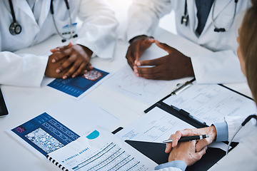 Image showing Paperwork, meeting and team of doctors consulting about medical treatment, medicine and surgery. Group of healthcare staff discussing patient results and documents in the hospital conference room.