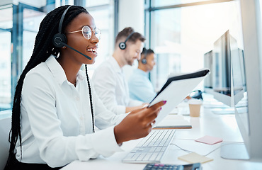 Image showing Contact us, customer support and happy call center consultant working in office, smiling while helping clients. Young professional female enjoying provide good online or virtual service and advice