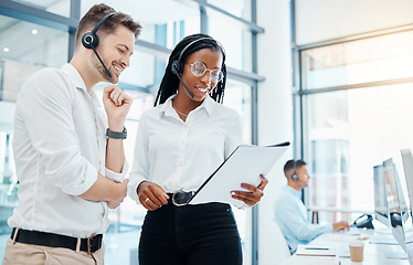 Image showing Call center, telemarketing and about us CRM consultants reading faq and qa training manual in a modern office. Collaboration, teamwork and diversity with man and woman at a customer support agency