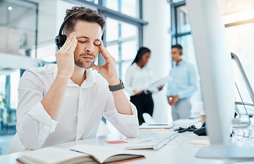 Image showing Work burnout, headache or stress for crm telemarketing sales worker, customer service or call center employee at office table. Online customer support or contact us help desk consultant with migraine