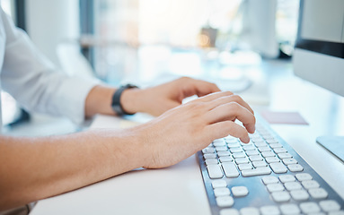 Image showing Closeup of businessman hands typing on keyboard of computer in corporate, creative and business office. Employee doing research on internet or programming web development and design with technology.