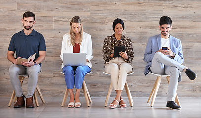 Image showing Business people waiting at interview or recruitment for work in a line, networking on tablet, cellphone and planning in a office together. Corporate employee, worker and professional at job center