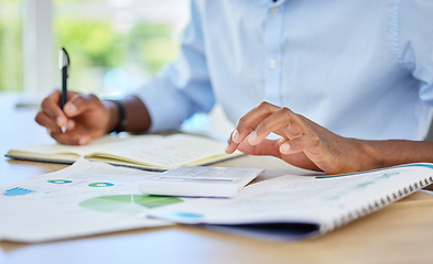 Image showing Budget, finance and a man with a calculator, writing financial reports and planning payments. Accounting, banking and investment, startup businessman looking at paperwork and accounts before funding.