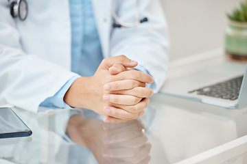 Image showing Doctor hands hope or praying sign for bad news in consultation with hospital office desk closeup. Healthcare therapist hand for serious discussion, diagnosis results or trust, advice and insurance