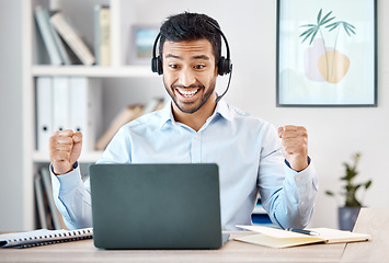 Image showing Call center, asian man and success deal with laptop in customer service, contact us support or crm consulting office. Wow, winner and happy telemarketing sales consultant with smile cheering b2b work