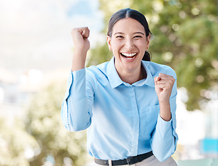 Image showing Business woman portrait, fist cheering and success, winning and bonus achievement in city outdoors. Happy, lucky smile and excited worker celebration deal, trading motivation and winner pride joy