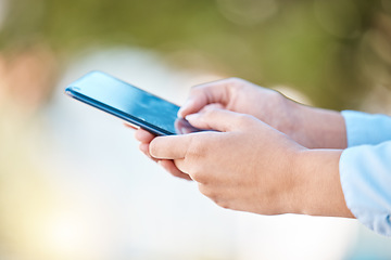 Image showing Communication, social media and a man typing on a phone in a park with bokeh. Contact, email and technology to talk to friends and family from any location with fast wifi or 5g internet connection