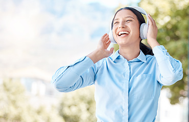 Image showing Woman with headphones happy listening to music on mp3 audio streaming song app singing to popular singer artist. Girl or young person smile, happiness and dancing to good internet joy and fun radio