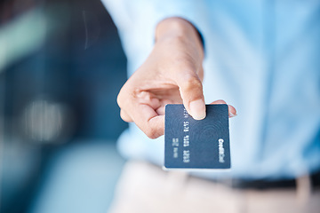 Image showing Credit card, shopping and macro hands of customer doing payment with a blur background. Money charge and transaction for commerce purchase with banking account in exchange for a product.