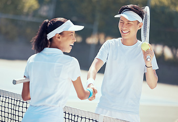Image showing Tennis, handshake and teamwork with a health athlete or coach shaking hands on a sports court, game or match. Fitness, workout and training with friends saying thank you, well done or congratulation