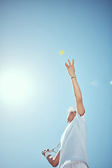 Image showing Court, tennis ball and athlete man swing racket in air for sports tournament with copy space. Focus and action in professional match game with competitive, determined and active person.