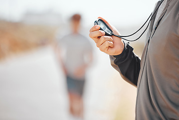 Image showing Fitness, coach and stopwatch of hands, time and runner speed and performance for record over blurred background. Hand of trainer in motivation for breaking times holding digital chronometer in sports