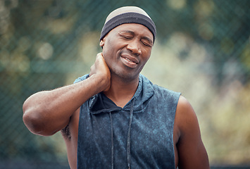 Image showing Sports, injury and neck of black man in massage exercise pain and emergency in the outdoors. African man suffering from sore muscle, tension and joint inflammation in sport fitness workout in nature