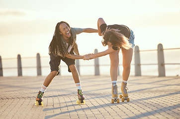 Image showing Freedom, fun and happy couple laughing and roller skating outdoors together, positive, playful and cheerful. Excited interracial boyfriend and girlfriend being crazy while enjoying skate practice