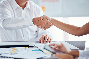 Image showing Businessman shaking hands with his partner to make a corporate deal at meeting in the office. Zoom of professional employees b2b welcome with handshake at company conference, workshop or convention