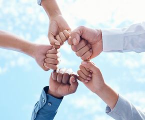 Image showing Teamwork collaboration, diversity fist bump and mission success of business. Partnership support, community team building goal and people group together. Contact us, we are hiring and staff hands