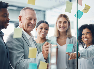 Image showing Business people planning with sticky note in meeting, writing advertising strategy on glass board and team collaboration for creative idea at work. Marketing workers working on design partnership