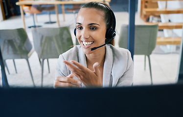 Image showing Call center worker consulting on consultation online on computer, woman working in crm for telemarketing company and customer service support on internet. Happy, smile and startup consultant at work