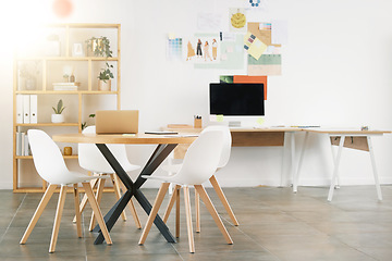 Image showing Office interior design, workspace building and desk table with wood chairs. Industrial professional room, concrete floor and white wall paint. Idea style storyboard, modern computer and empty decor
