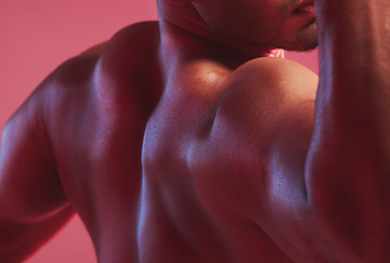 Image showing Sexy man, strong back and muscle bodybuilder in nude, fitness and skin against colorful studio background. Naked, healthy and powerful guy closeup with shoulder strength, muscular and flexing arms